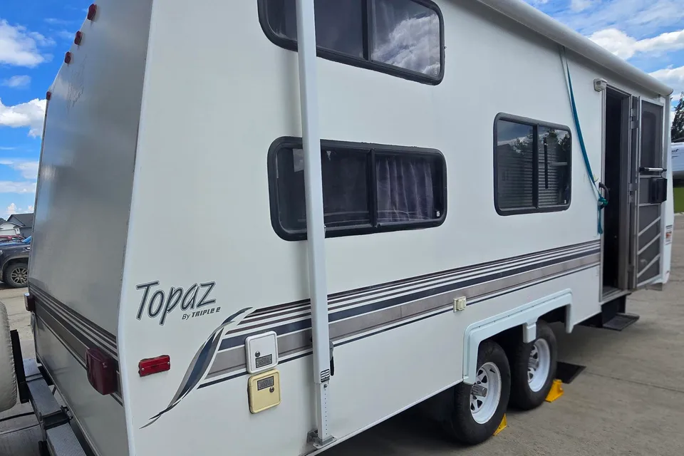 Triple Trouble Topaz Travel Trailer Cabin