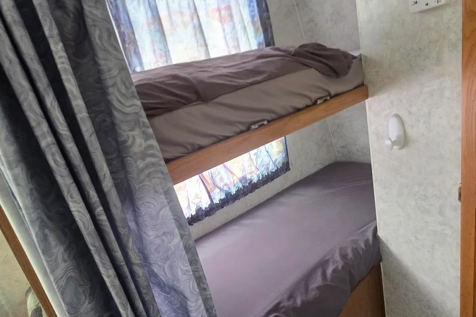 Triple Trouble Topaz Travel Trailer Cabin