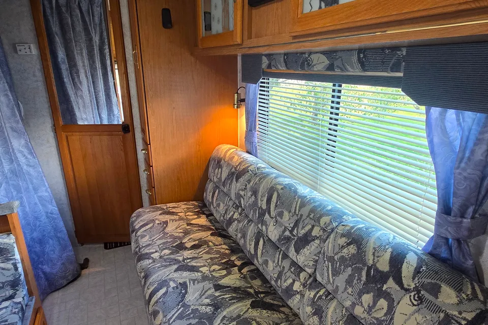Triple Trouble Topaz Travel Trailer Cabin