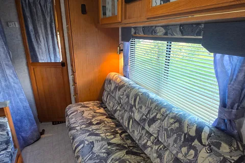 Triple Trouble Topaz Travel Trailer Cabin