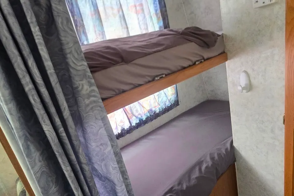 Triple Trouble Topaz Travel Trailer Cabin