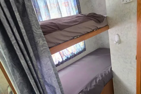 Triple Trouble Topaz Travel Trailer Cabin