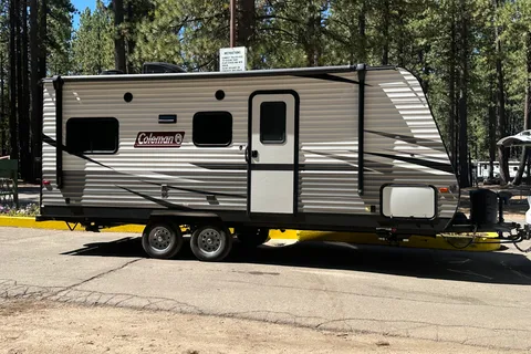 Coleman Lantern 202RDWE Travel Trailer  named “TOWBIE”