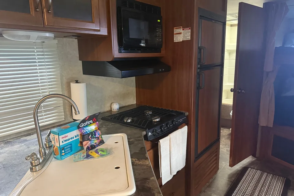 Laura's cozy Keystone Cougar Travel Trailer