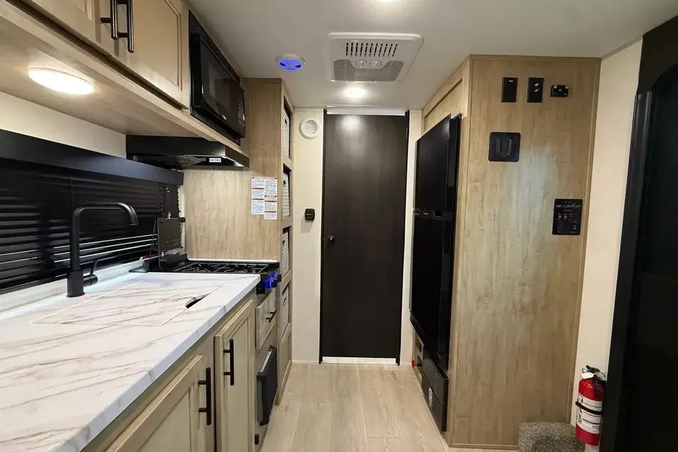 Rob & Wolf.  Cherokee Wolf Pup 16CM Travel Trailer