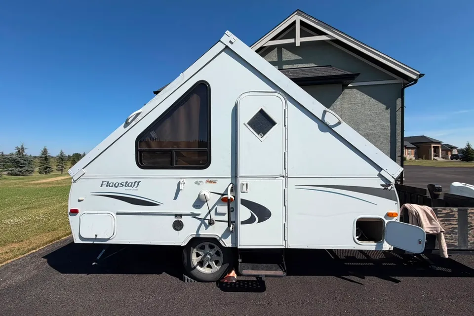 Musesica Forest River Flagstaff 12SDTH toy hauler A Frame Travel Trailer