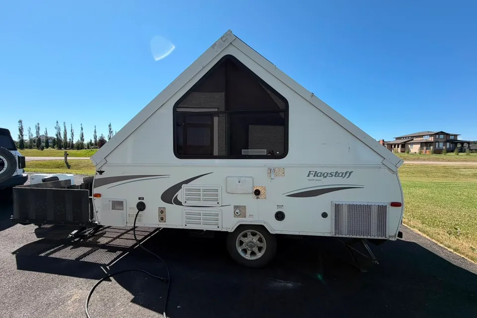 Musesica Forest River Flagstaff 12SDTH toy hauler A Frame Travel Trailer