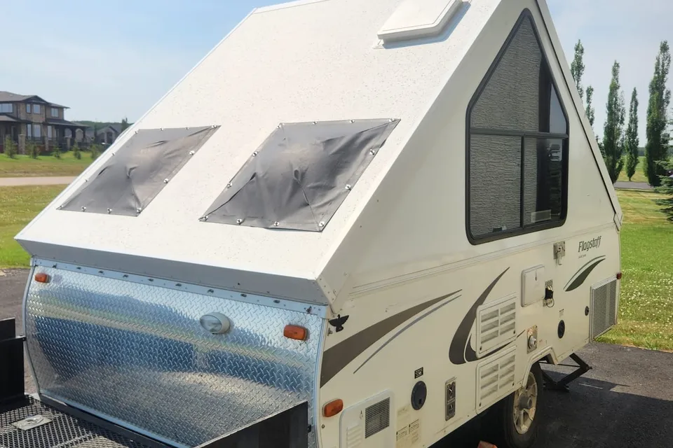 Musesica Forest River Flagstaff 12SDTH toy hauler A Frame Travel Trailer
