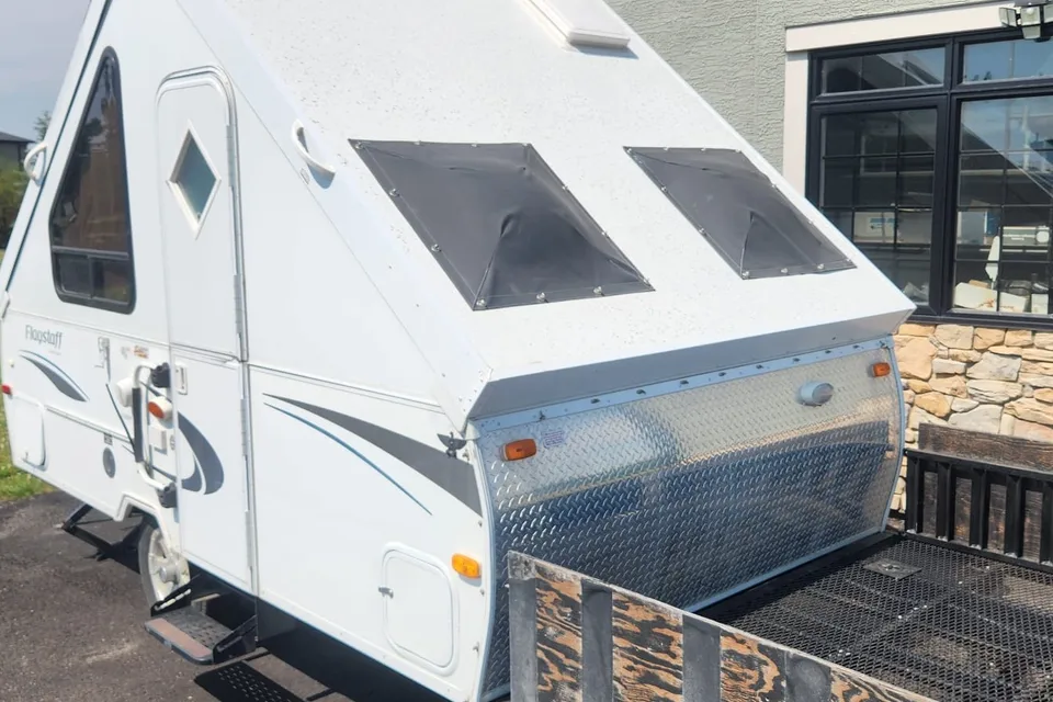 Musesica Forest River Flagstaff 12SDTH toy hauler A Frame Travel Trailer