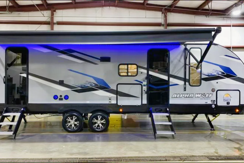 The Berger family Forest River Alpha wolf Travel Trailer