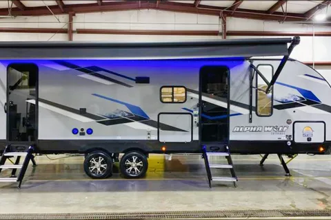 The Berger family Forest River Alpha wolf Travel Trailer