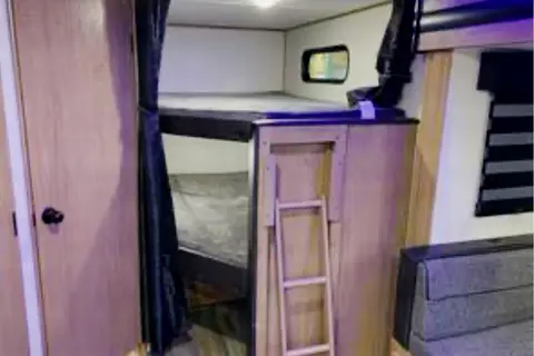 The Berger family Forest River Alpha wolf Travel Trailer