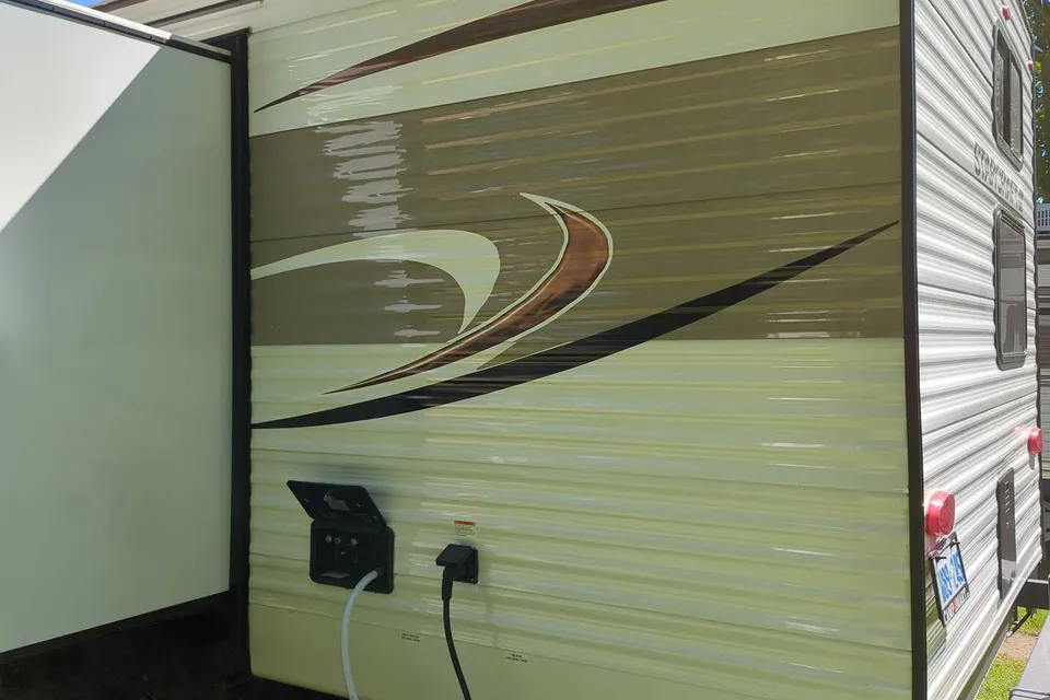 The Campbell's Starcraft 26BHS Travel Trailer