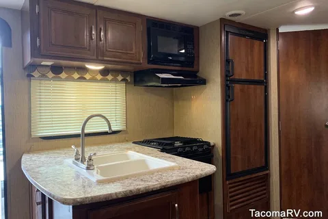 Landon's Keystone Passport 3350BHWE Travel Trailer