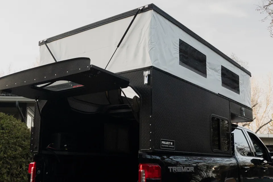 Raptor Rooftop Rentals Ford F-350 Ultimate Tremor with 4 Wheel Truck Camper