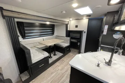 “Monique” - New 2022 Forest River Grey Wolf 23 MKBL Black Label