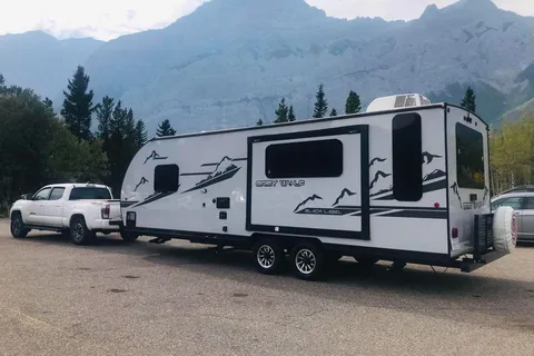 “Monique” - New 2022 Forest River Grey Wolf 23 MKBL Black Label