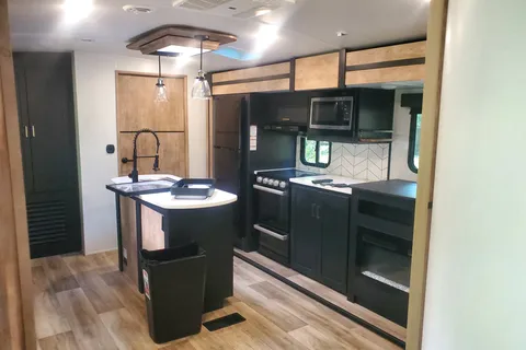 Thrasher's Keystone outback 340bh Travel Trailer