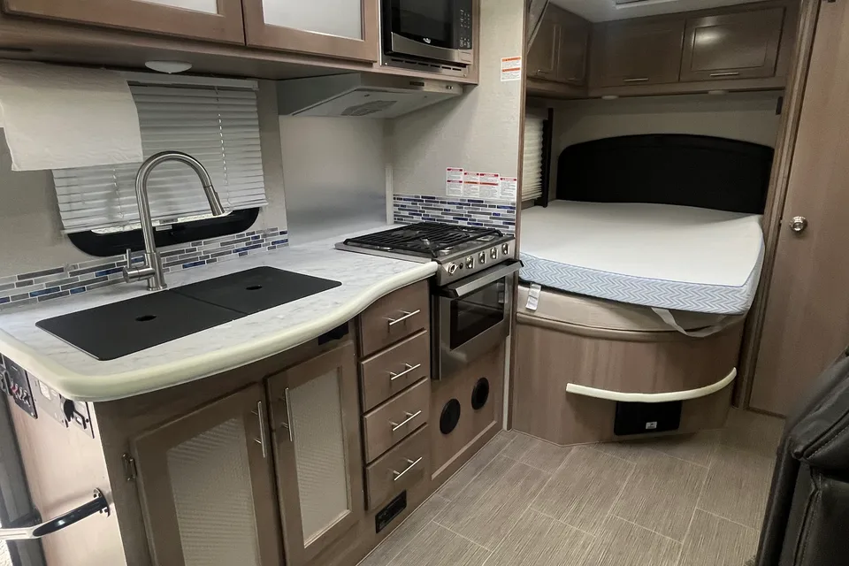 VONG's 2019 Family Ford Adventure 24ds with Slideout Class C