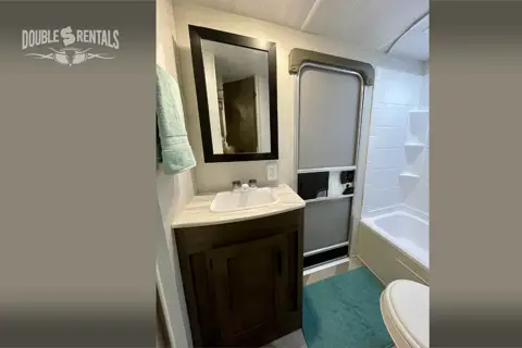 WILDWOOD X-LITE Bunkhouse w/ Keyless Entry, Private Master & Elec Fireplace