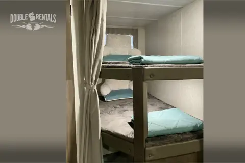 WILDWOOD X-LITE Bunkhouse w/ Keyless Entry, Private Master & Elec Fireplace
