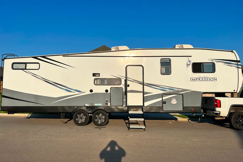 James's Forest River Impression Fifth Wheel