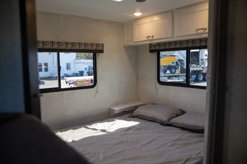 C06 - 10 Person w/ Bunk- The RV Rental Factory