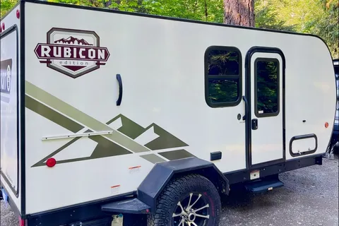 Ivanna and Igor's Coleman Rubicon 1400BH Travel Trailer