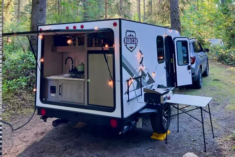 Ivanna and Igor's Coleman Rubicon 1400BH Travel Trailer