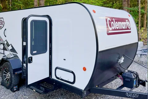 Ivanna and Igor's Coleman Rubicon 1400BH Travel Trailer