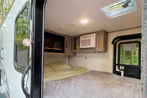 Ivanna and Igor's Coleman Rubicon 1400BH Travel Trailer