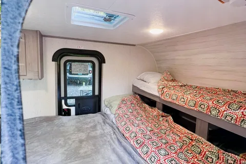 Ivanna and Igor's Coleman Rubicon 1400BH Travel Trailer