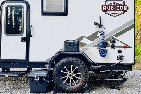 Ivanna and Igor's Coleman Rubicon 1400BH Travel Trailer