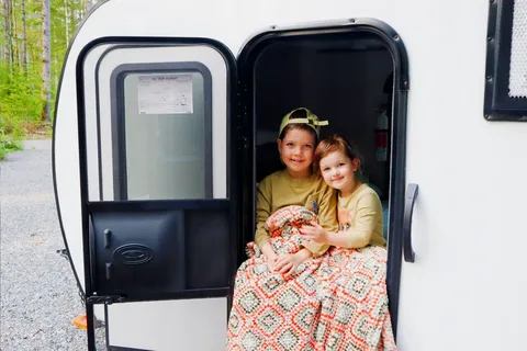 Ivanna and Igor's Coleman Rubicon 1400BH Travel Trailer