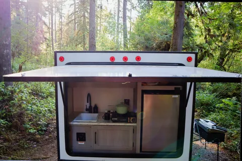 Ivanna and Igor's Coleman Rubicon 1400BH Travel Trailer