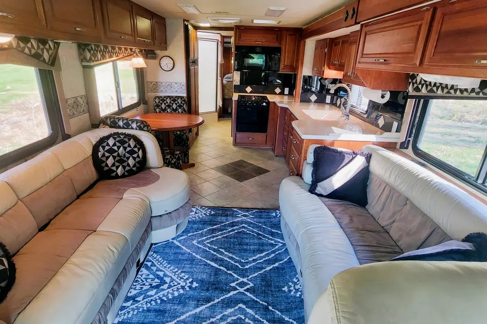 Ozzy's Castle on Wheels Fleetwood Revolution Class A