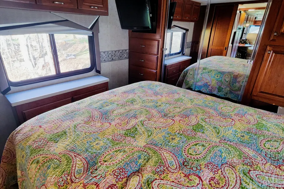 Ozzy's Castle on Wheels Fleetwood Revolution Class A