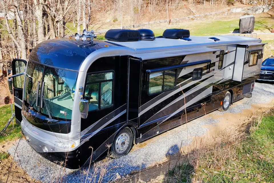Ozzy's Castle on Wheels Fleetwood Revolution Class A