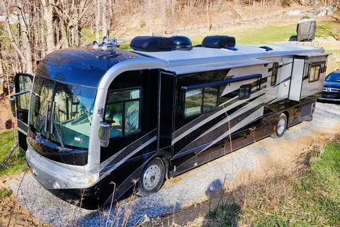 Ozzy's Castle on Wheels Fleetwood Revolution Class A