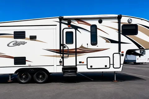 Jacob & Hannah's Cozy Keystone Cougar 29 RLI Fifth Wheel