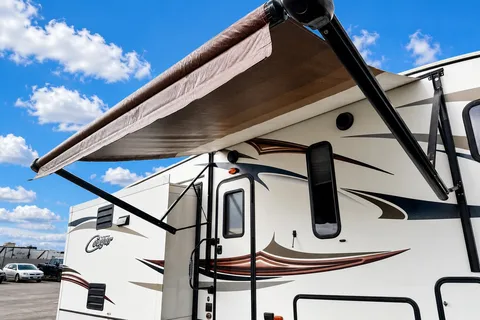Jacob & Hannah's Cozy Keystone Cougar 29 RLI Fifth Wheel