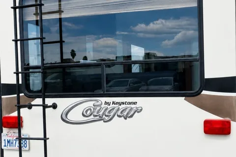 Jacob & Hannah's Cozy Keystone Cougar 29 RLI Fifth Wheel