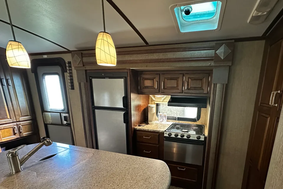 Bridge Family Keystone Outback Diamond Super Lite Travel Trailer
