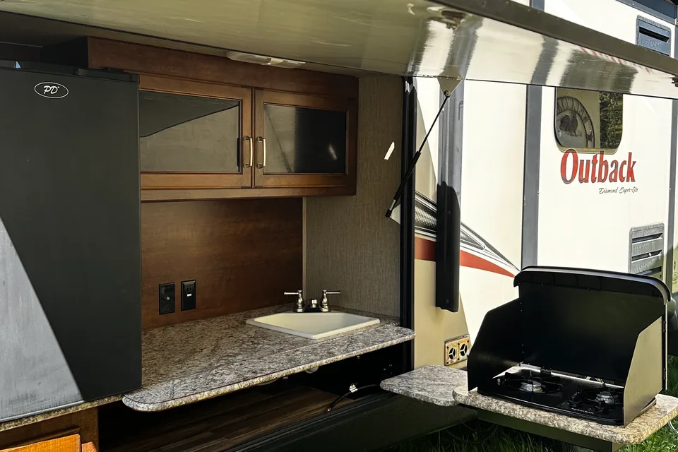Bridge Family Keystone Outback Diamond Super Lite Travel Trailer
