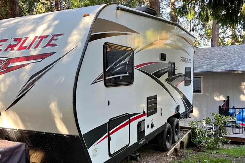 Toy hauler in the trees