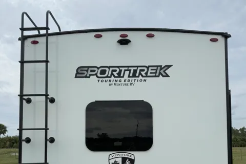 Troy & Kaila’s Venture RV SPORTTREK Travel Trailer