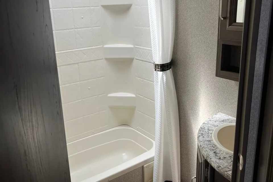 the 2pins Keystone passport ultra lite Travel Trailer