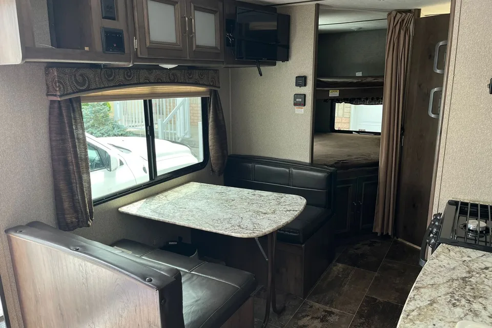 the 2pins Keystone passport ultra lite Travel Trailer