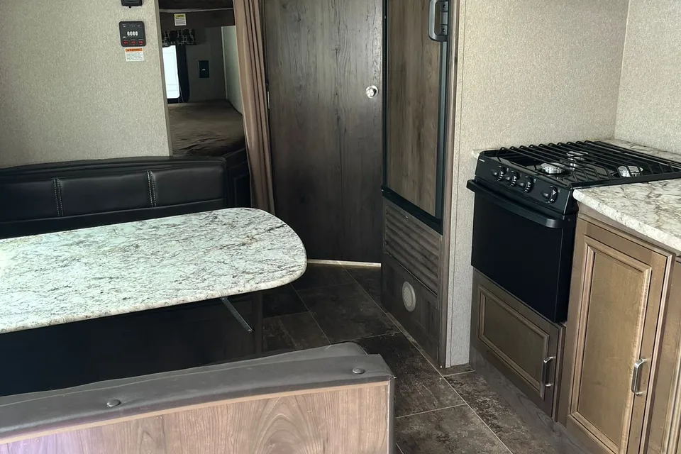 the 2pins Keystone passport ultra lite Travel Trailer