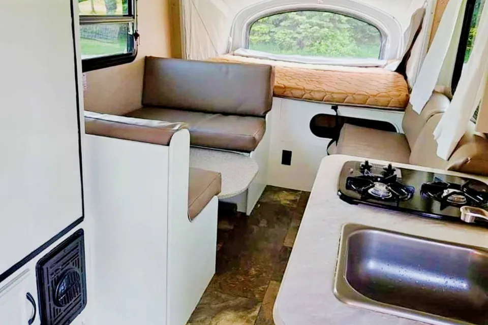 Adams Family Jayco Feather Ultra Lite SLX Hybrid